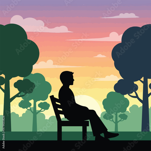 A man sits on a bench in a park at sunset