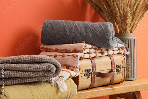 Warm plaids with suitcase o...