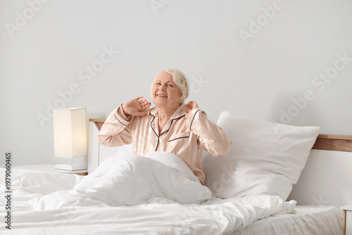 Morning of happy senior wom...