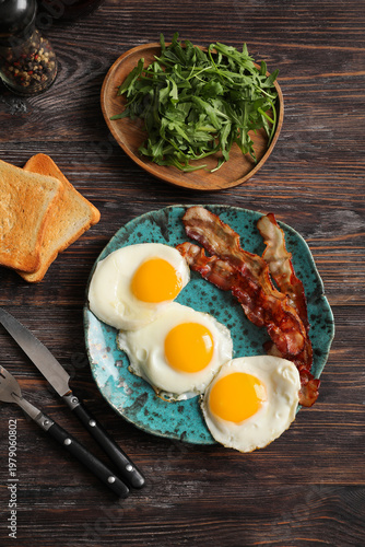 Plate with tasty fried eggs...