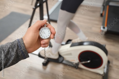 Male hand with stopwatch ag...