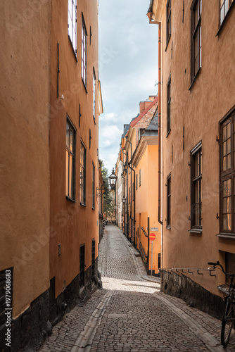 Gamla Stan old city in Stockholm, Sweden views of orange and yellow homes.