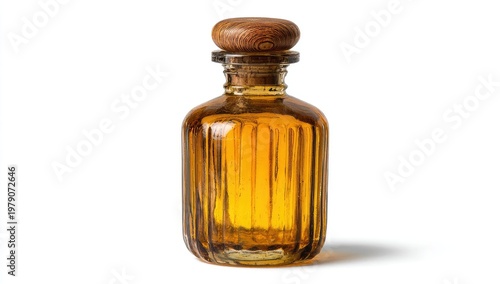 Amber glass bottle with vertical ridges, capped with wood, holding amber liquid