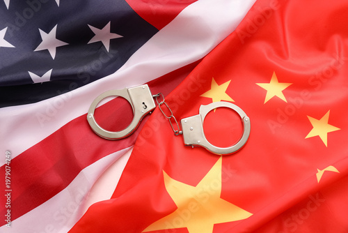 Handcuffs on flags of China...