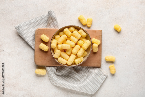 Bowl with sweet corn sticks...