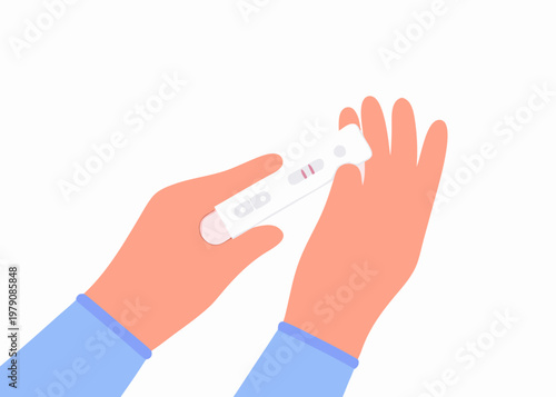 Hands holding a positive pregnancy test indicating expectant motherhood