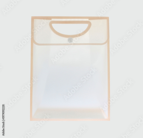 Clear soft  plastic folder bag with beige edges. Simple design with rounded top handle. Transparent body shows interior space clearly button closure, minimalist supply, isolated on white background. 