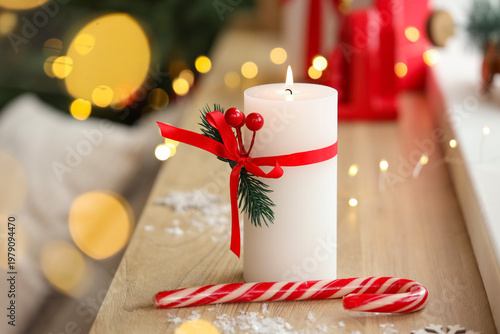 Burning candle with Christm...