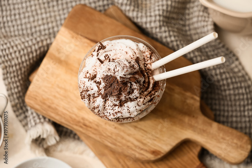 Glass of cold cocoa drink w...