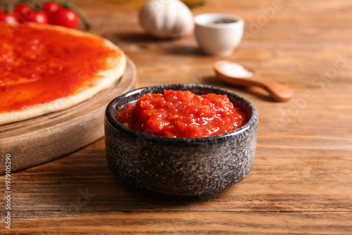 Bowl with tasty tomato sauc...