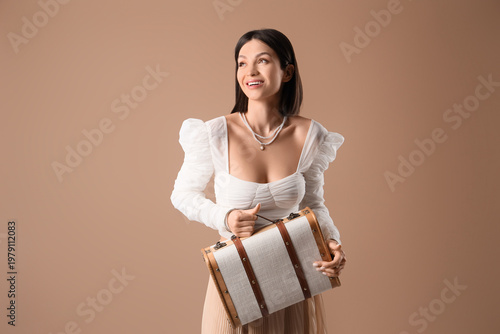 Happy fashionable young wom...