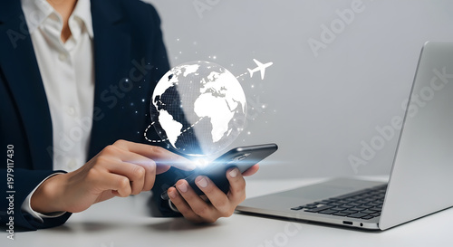 Businesswoman using smartphone with glowing digital globe and airplane hologram symbolizing global travel