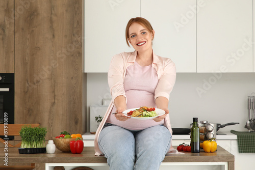 Young pregnant woman with t...