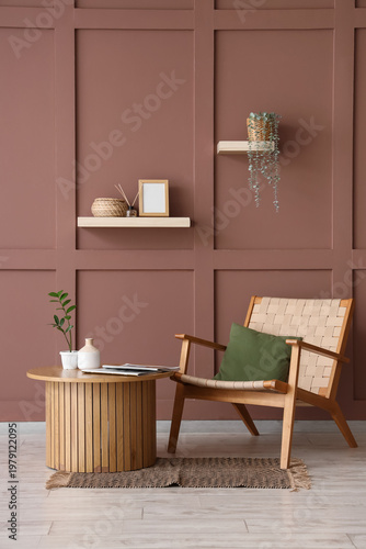 Wooden table and wicker arm...