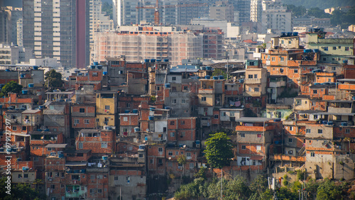Urban social contrast in Sao Paulo with Paraisopolis favelas against modern skyline with copy space