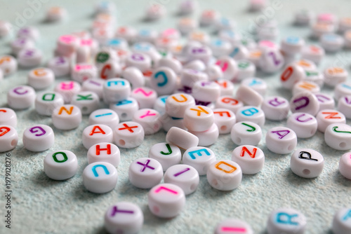 Many English letters on lig...