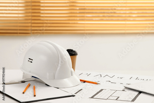 Hardhat with clipboard and ...