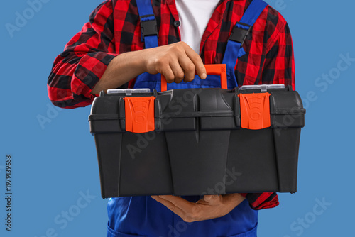 Male constructor with tool ...