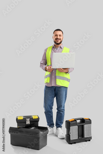 Male constructor with tool ...