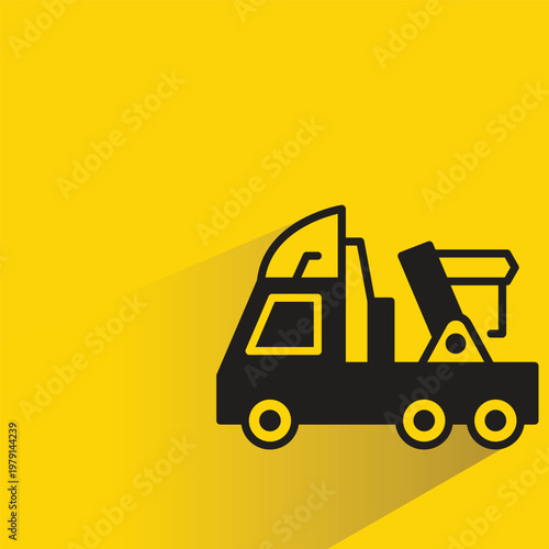 breakdown truck icon with shadow on yellow background