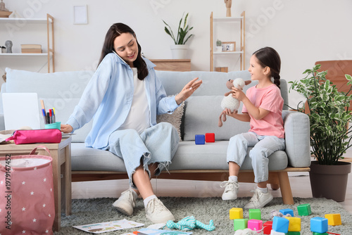 Working pregnant mother and...