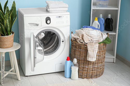 Stylish laundry room with m...
