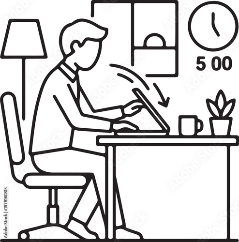 Young man closing laptop computer at office desk after work day ends.