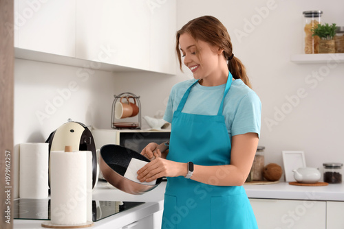 Young woman with paper napk...