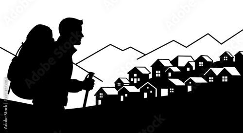 Hiker silhouette looking at village.