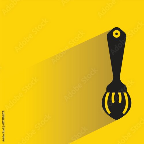 paint brush icon with shadow on yellow background