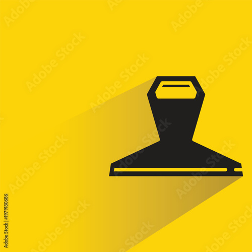 paper clip icon with shadow on yellow background