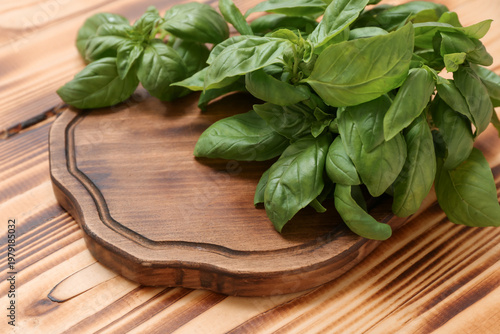 Board with fresh green basi...