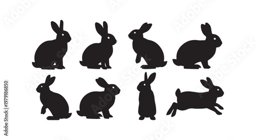 A flock of black birds in flight with their wings spread in a synchronized pattern