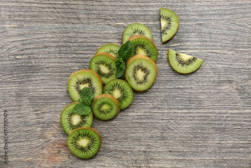 Slices of fresh kiwi and mi...