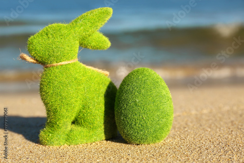 Toy bunny and Easter egg on...