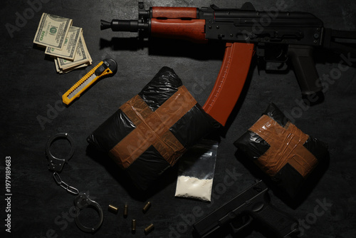 Drug packages with guns, mo...