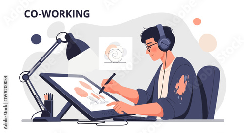 Digital Artist Working on Graphic Tablet in Co-working Space