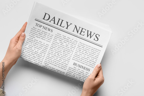 Female hands with daily new...
