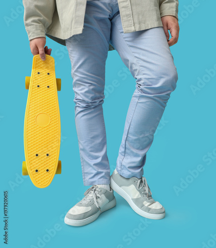 Young man in stylish sneake...