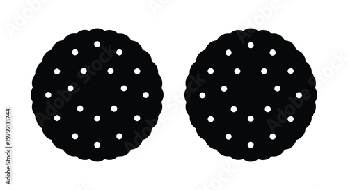 Two circular biscuits with dotted surfaces in a simple black and white design