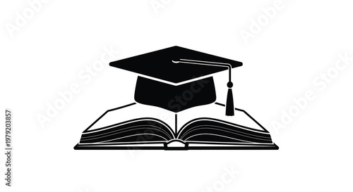 A black graduation cap rests atop an open book symbolizing education
