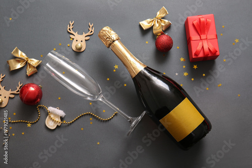 Bottle of champagne with gl...