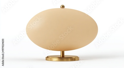 A striking egg-shaped lamp with a metallic gold base and finial