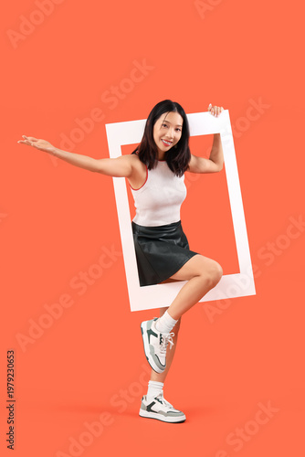 Young beautiful Asian woman...
