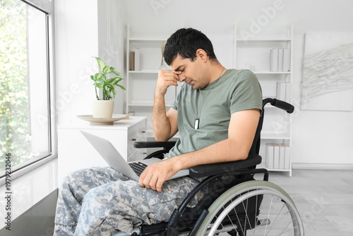Stressed young soldier in w...