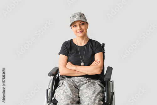 Female soldier in wheelchai...