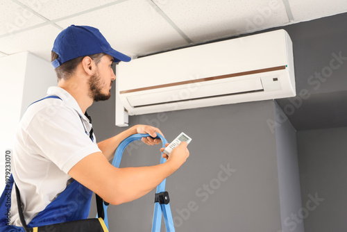 Male technician switching o...
