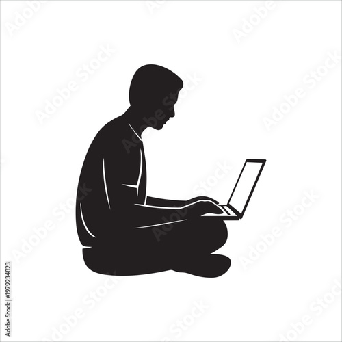 Man sitting on floor using laptop silhouette for remote work or study from home concept.
