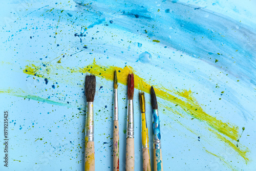 Artist's brushes with paint...