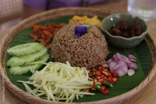 Mixed herb rice salad with side dishes.